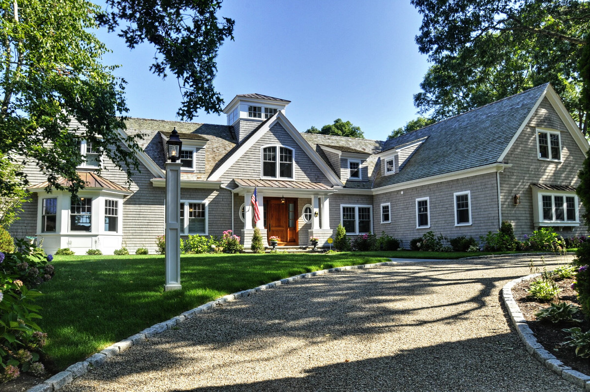 Drive and front entry of beautiful remodeled home in Cotuit